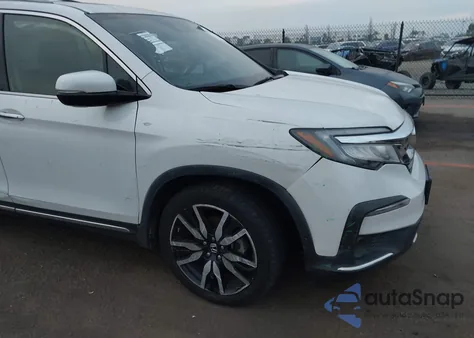 2021 Honda Pilot 2Wd Touring 8 Passenger z USA, uszkodzony, nr VIN 5FNYF5H90MB001707